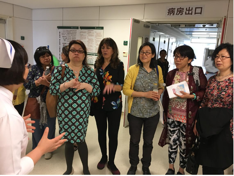 Visiting NYSNA nurses listen to a nurse at Peking Medical Union Hospital speak