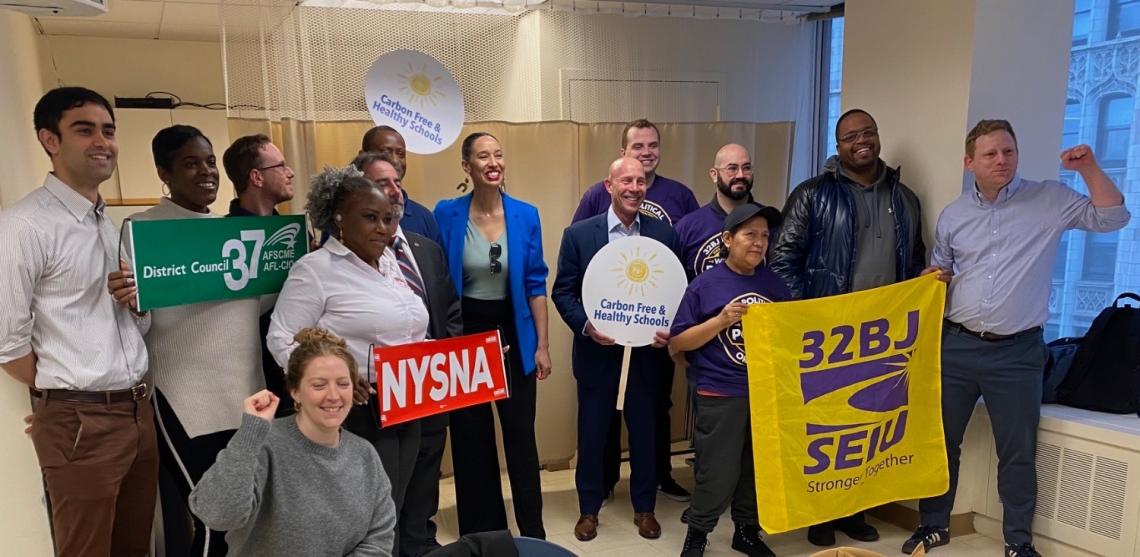 Union leaders from NYSNA, 32 BJ, DC 37 gather for a photo promoted Carbon Free and Healthy Schools