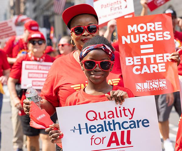 Nurse and Daughter March in 2023 Labor Day Parade