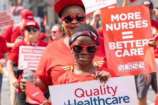 Nurse and Daughter March in 2023 Labor Day Parade