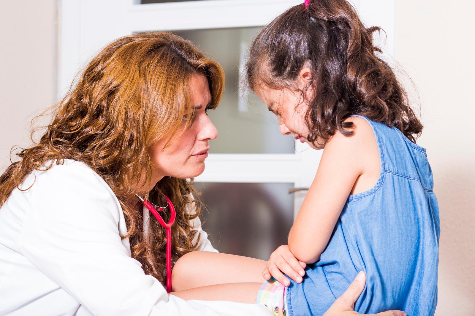 child with nurse