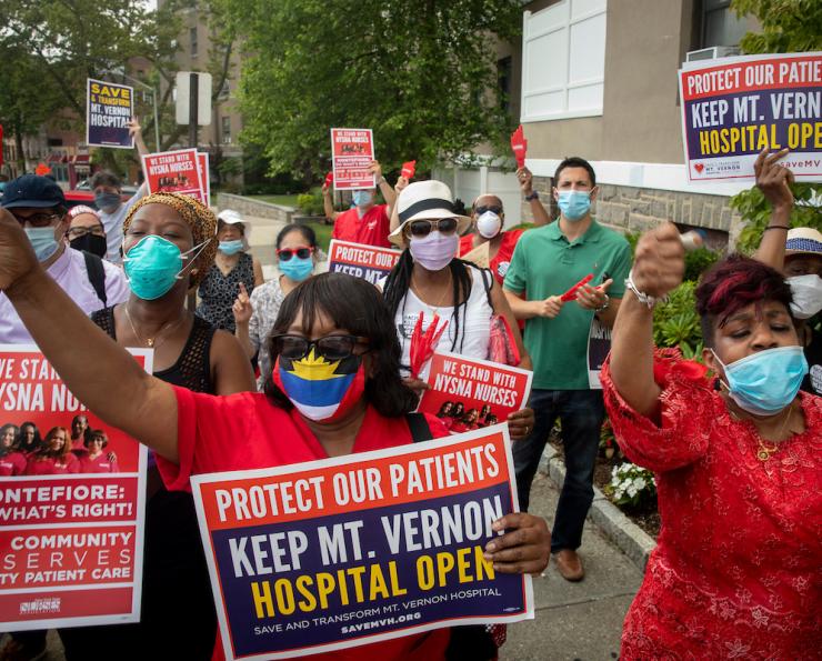 Nurses wearing face masks march and rally to keep Mount Vernon Hospital open