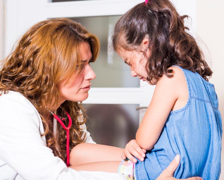 child with nurse