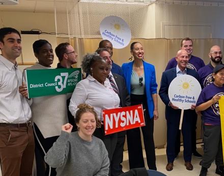 Union leaders from NYSNA, 32 BJ, DC 37 gather for a photo promoted Carbon Free and Healthy Schools