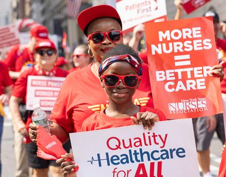 Nurse and Daughter March in 2023 Labor Day Parade