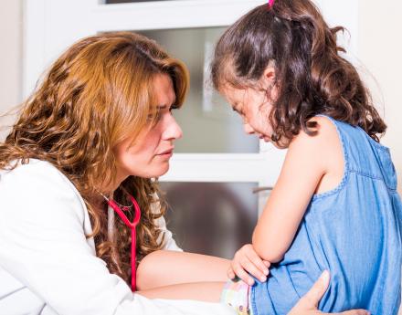 child with nurse